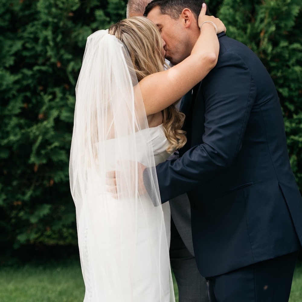 Beautiful long ivory veil with satin/silk lining